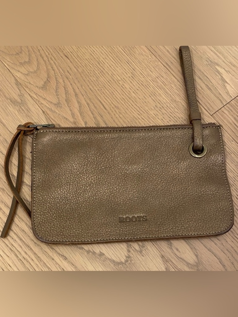 Roots Tan Leather Wristlet